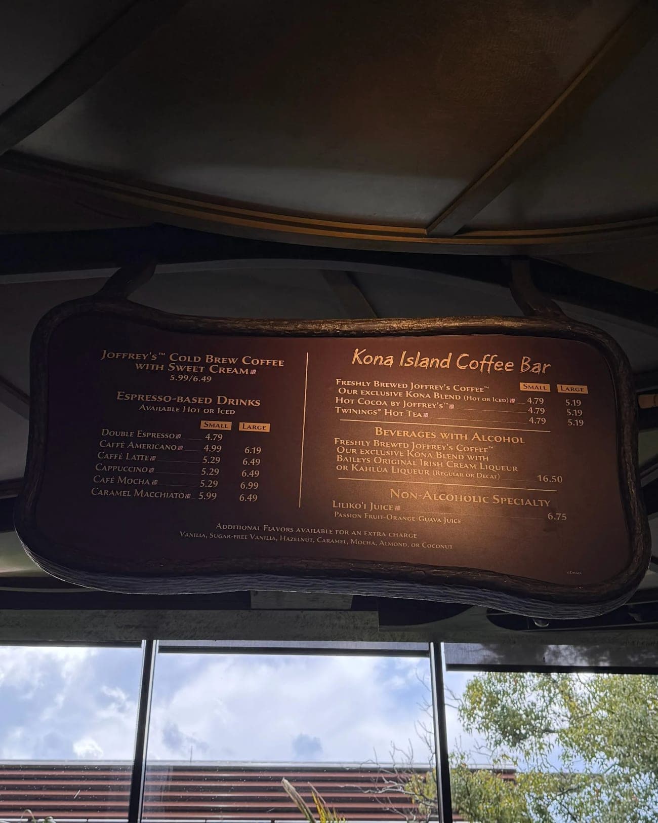 Kona Island Coffee Bar overhead menu board with prices