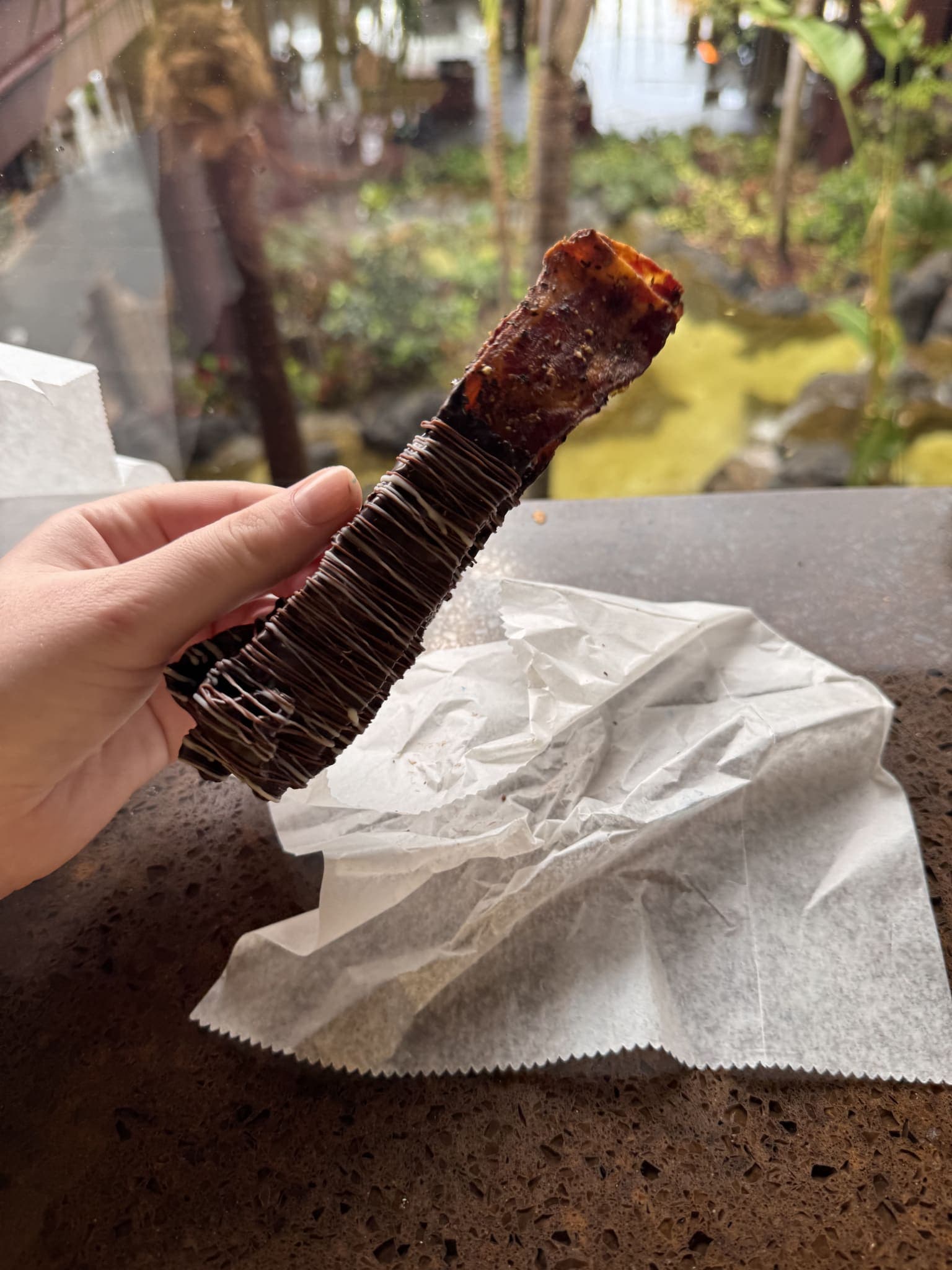 Close-up of chocolate-covered bacon from Kona Island