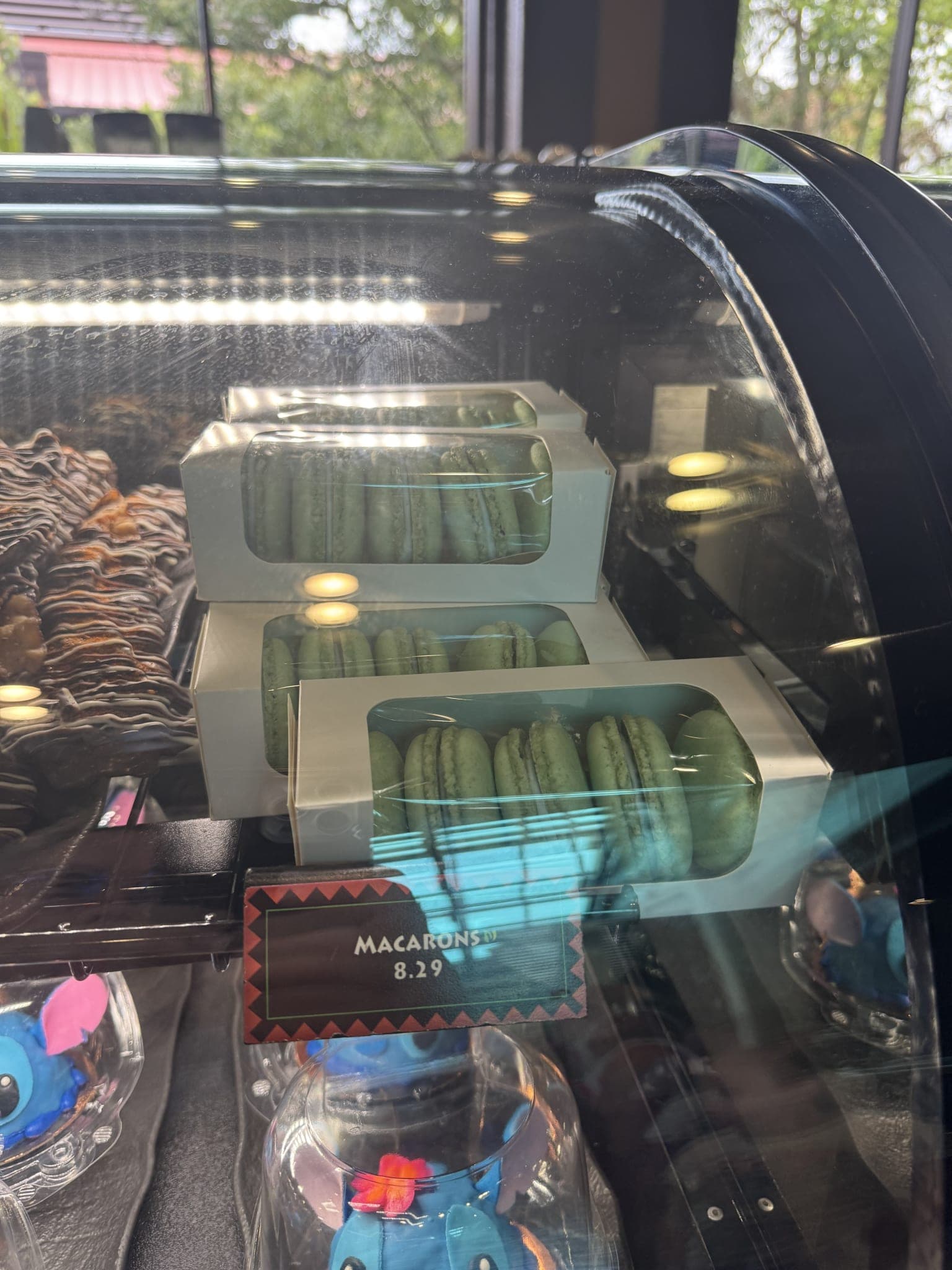 Boxed passion fruit-orange-guava macarons