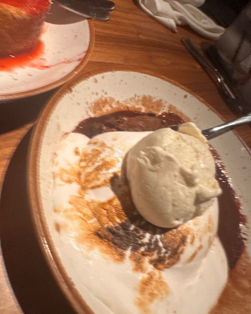 S'more Brownie Sundae loaded with marshmallow and a scoop of vanilla ice cream