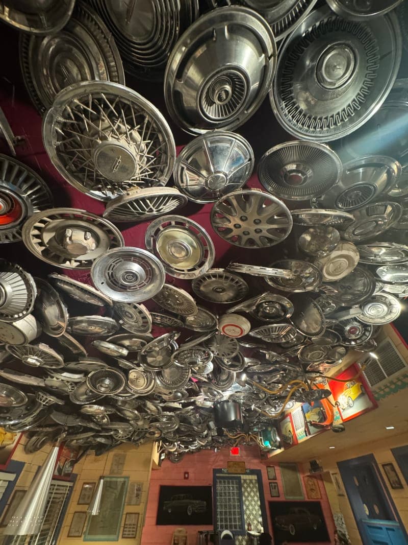 Dining Room ceiling covered in hub caps